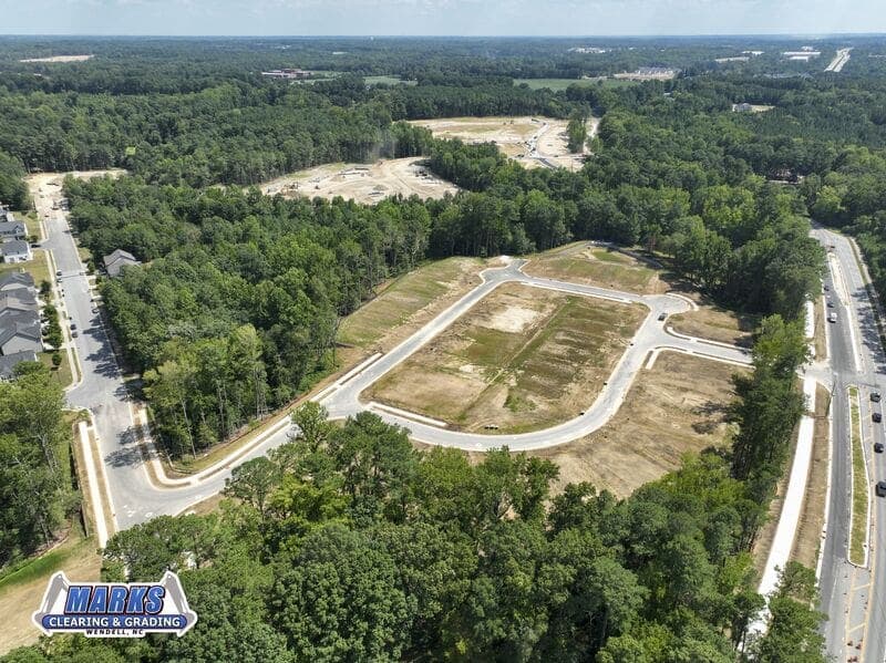 Marks Clearing & Grading moves to curb and asphalt at KB Home's Magnolia Forest